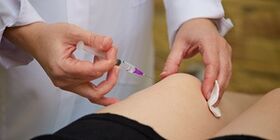 Injection of hyaluronic acid into the knee joint